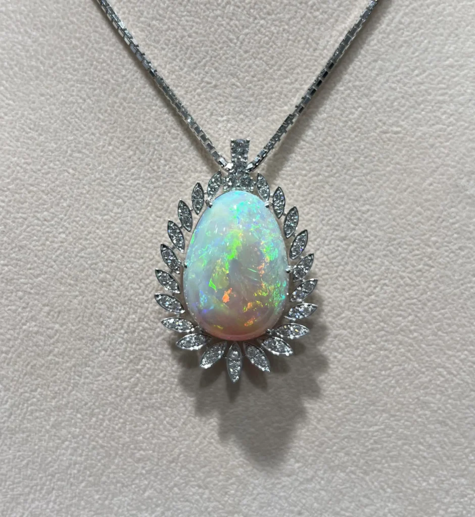 An iridescent pendant from the Nicholls vintage and estate imagery