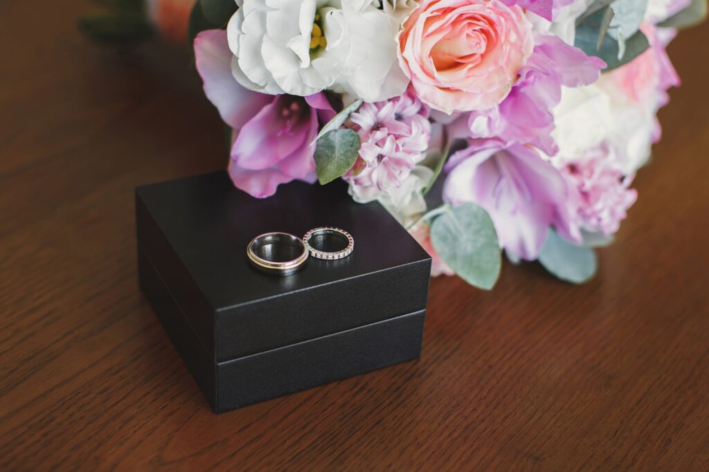 Engagement rings in wooden box.